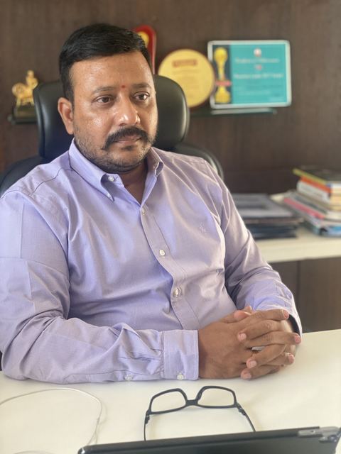 At his office